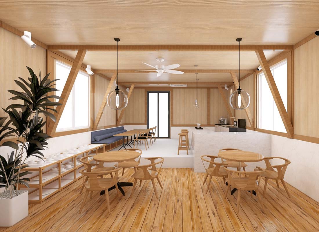 A kitchen/dining area that is mostly wood and feels very warm