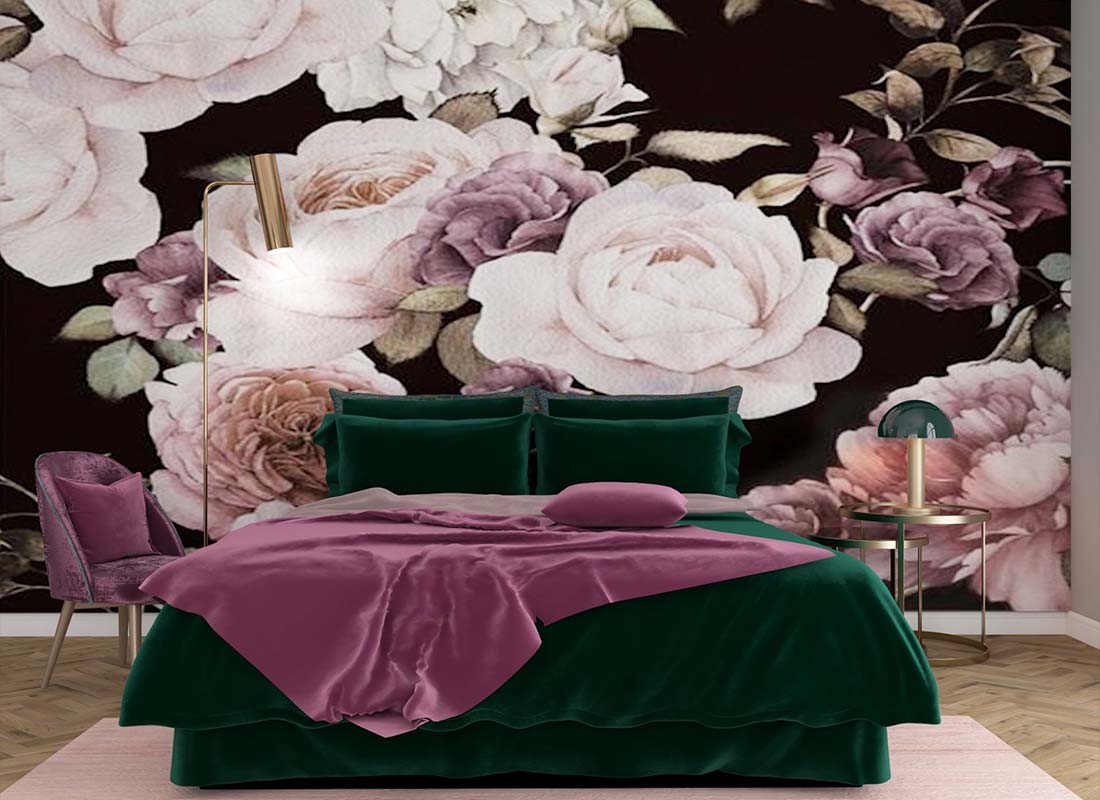 A bedroom with a huge mural of flowers behind a dark green and pink bed