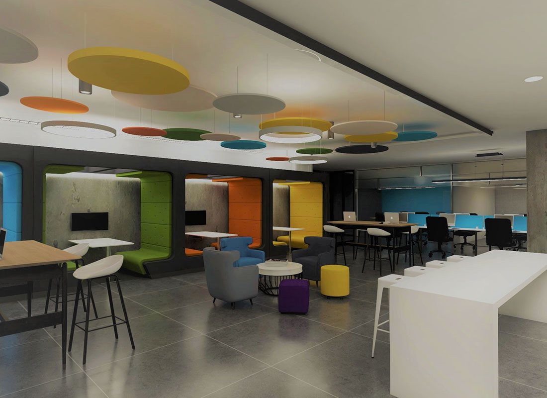 A shared office space with futuristic colorful circles on the ceiling
