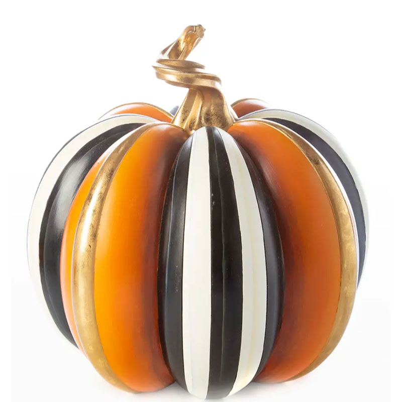 A plastic pumpkin with stripes